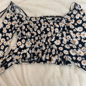 black ruffle top with flowers